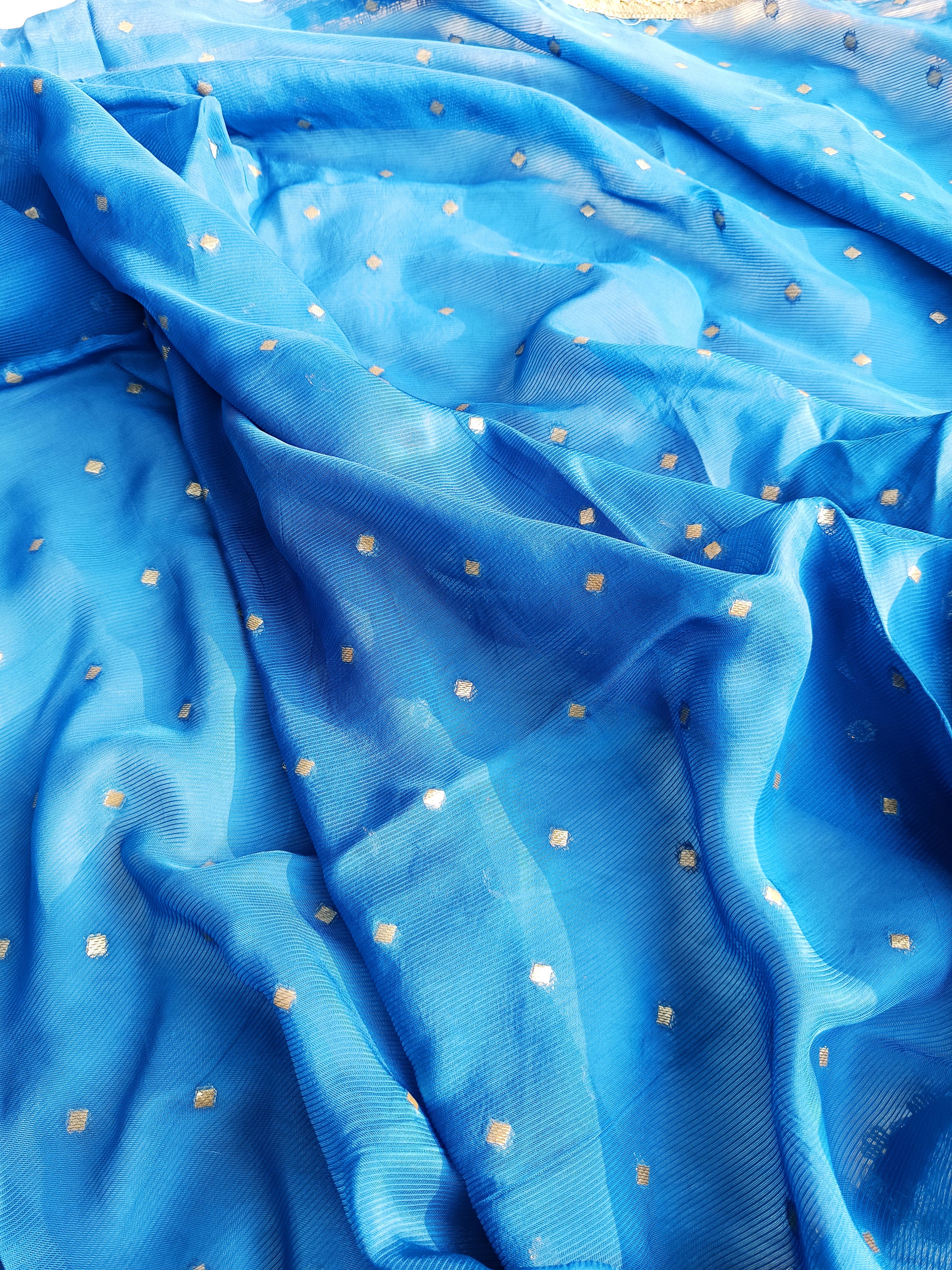 Handcrafted organza suit neatly displayed on a hanger to highlight its design.