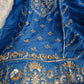  Closeup of embellished patterns and handwork on the soft organza material.