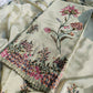 Embroidered organza silk suit with subtle sequin work and soft shine, ideal for elegant occasions