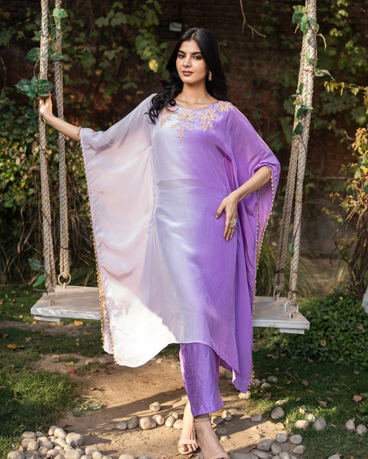  Elegant royal purple kaftan with flowing silhouette and intricate design