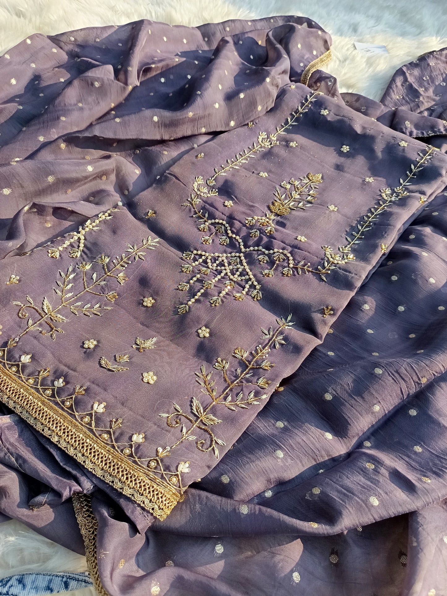Side angle showcasing the flowing fit and handwork of the Shimmer Organza Suit.