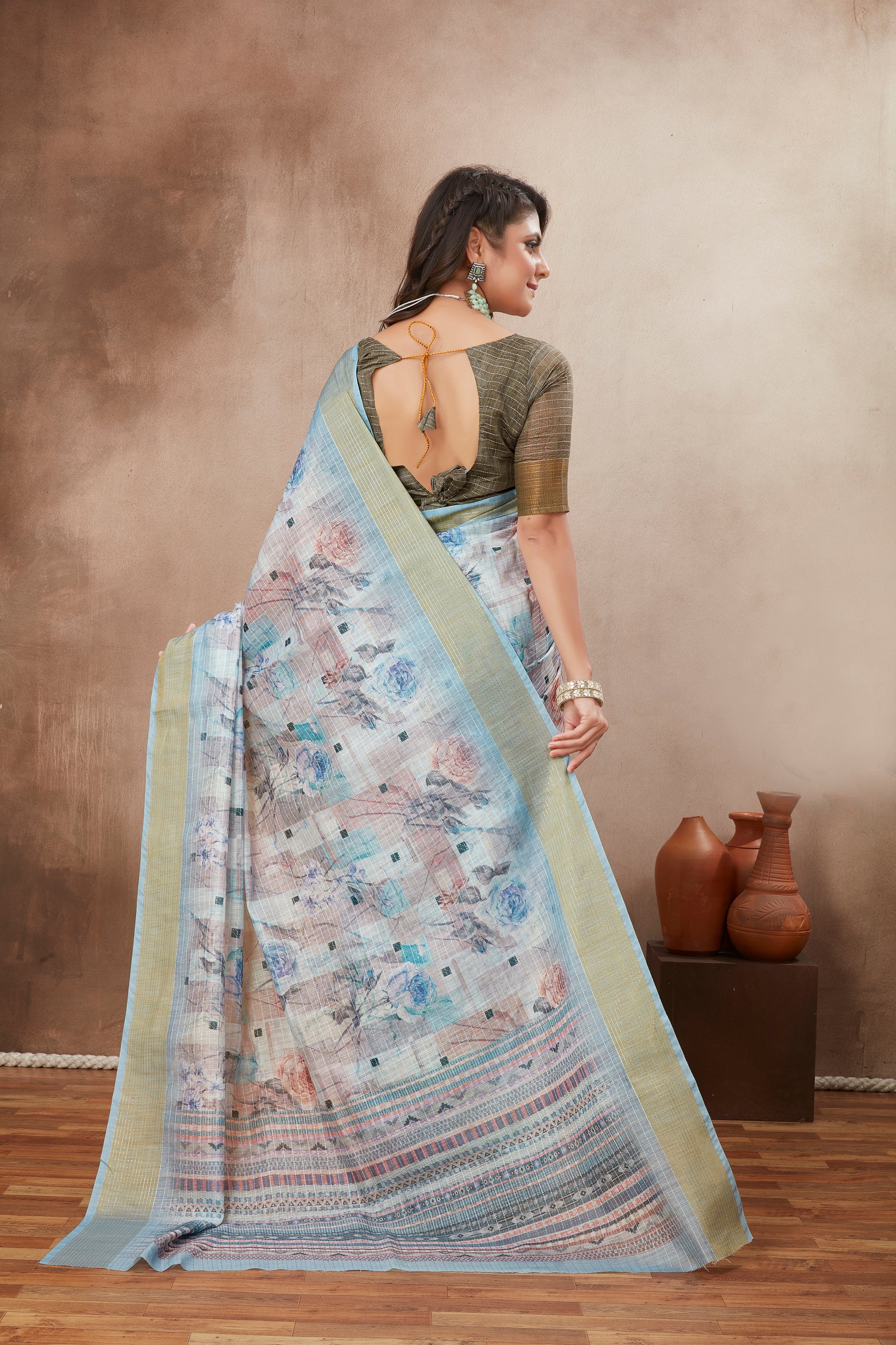 Graceful cotton silk saree in light blue, ideal for festive occasions or daily elegance.