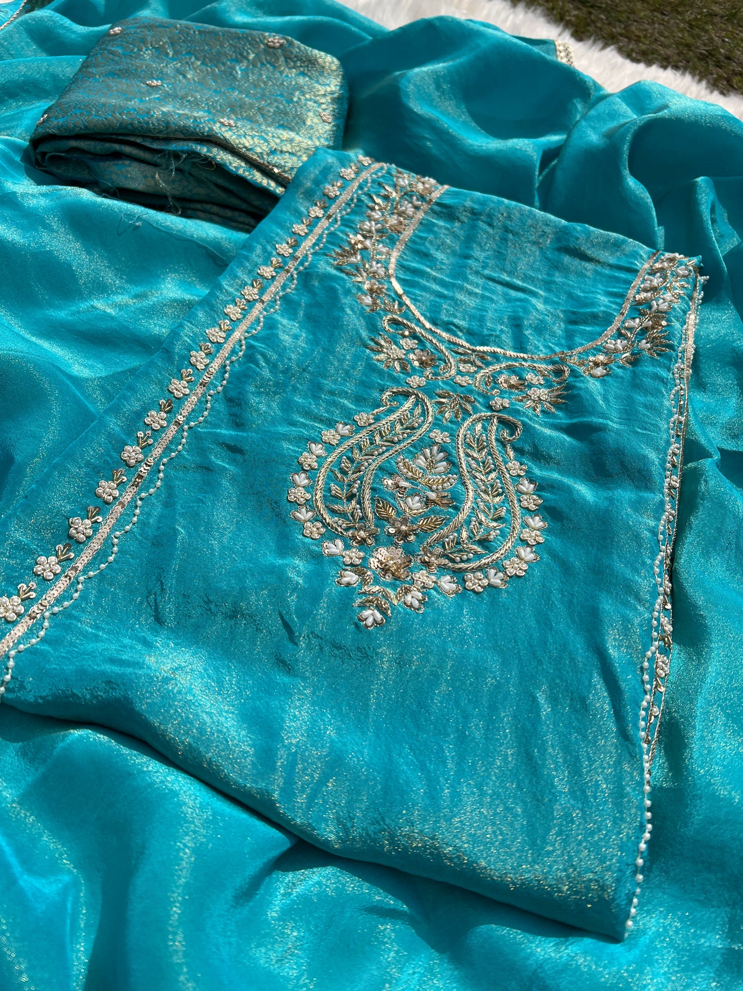 Mauve shimmer organza set featuring refined handwork and festive elegance