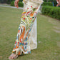 Stylish yellow fringe co-ord ensemble with a bold design