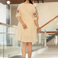 Sunshine yellow tunic with floral embroidery that adds a festive touch