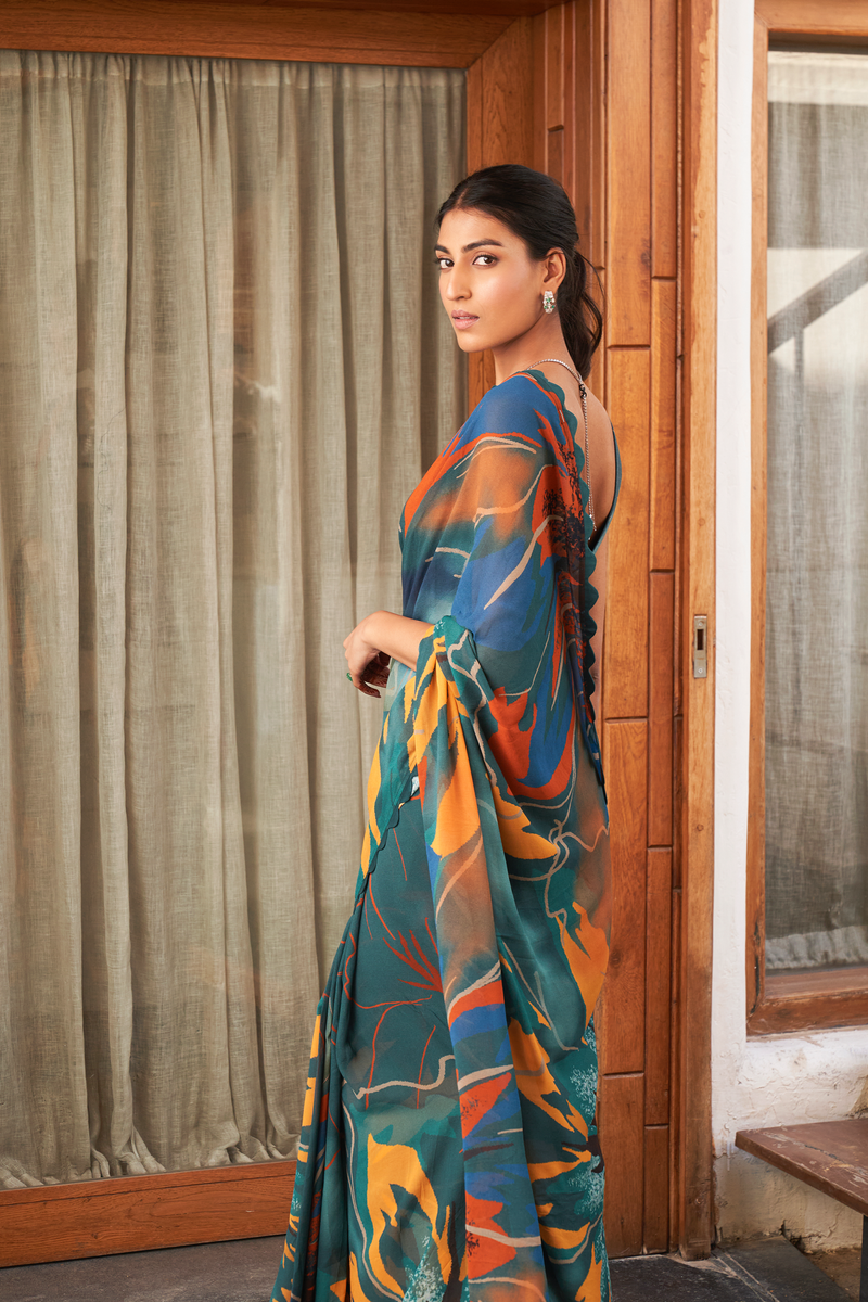 Graceful Teal Blue Moss Saree with vibrant multicolor prints