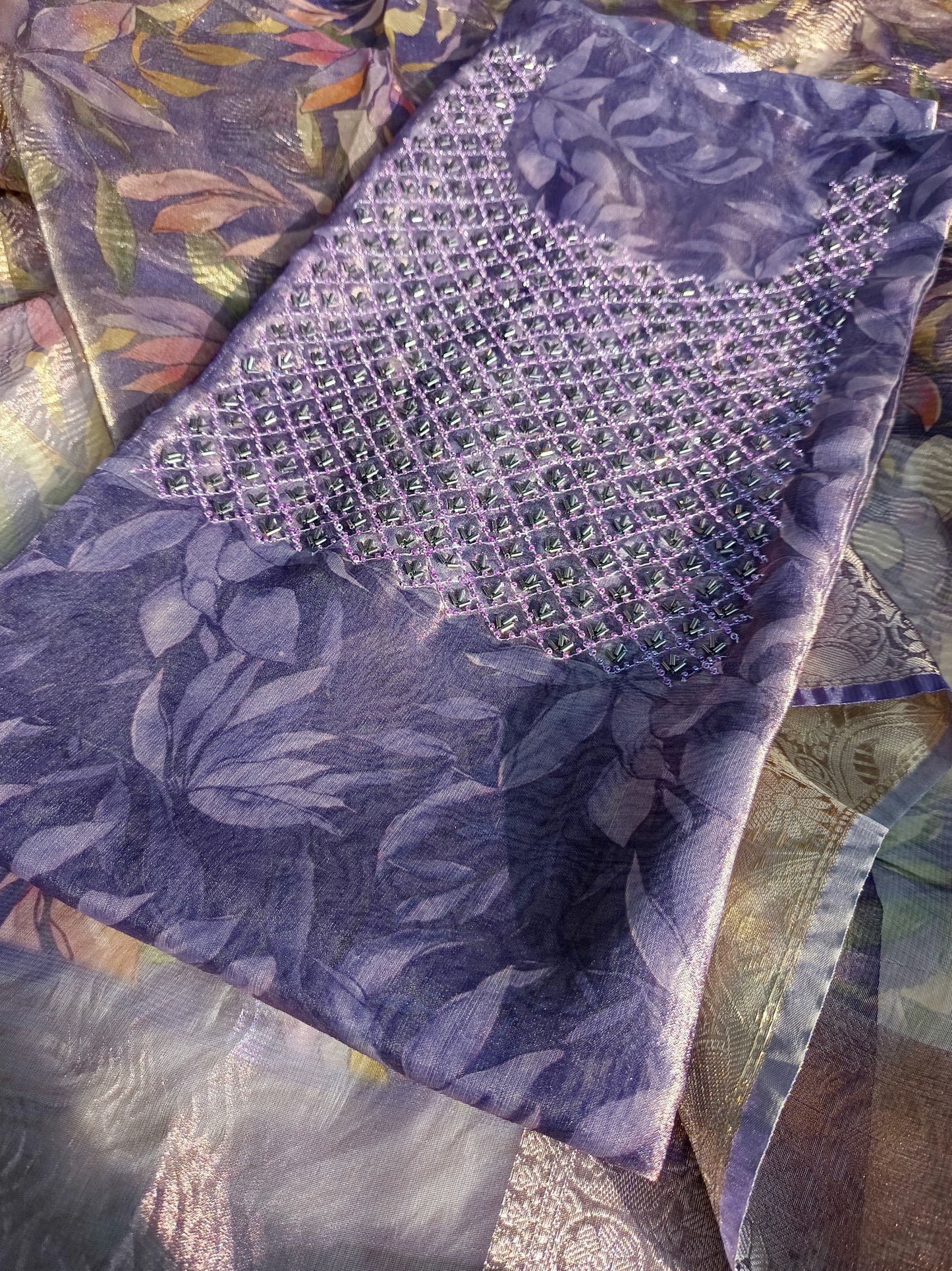 Designer tissue silk dupatta paired with a hand embroidered kurta