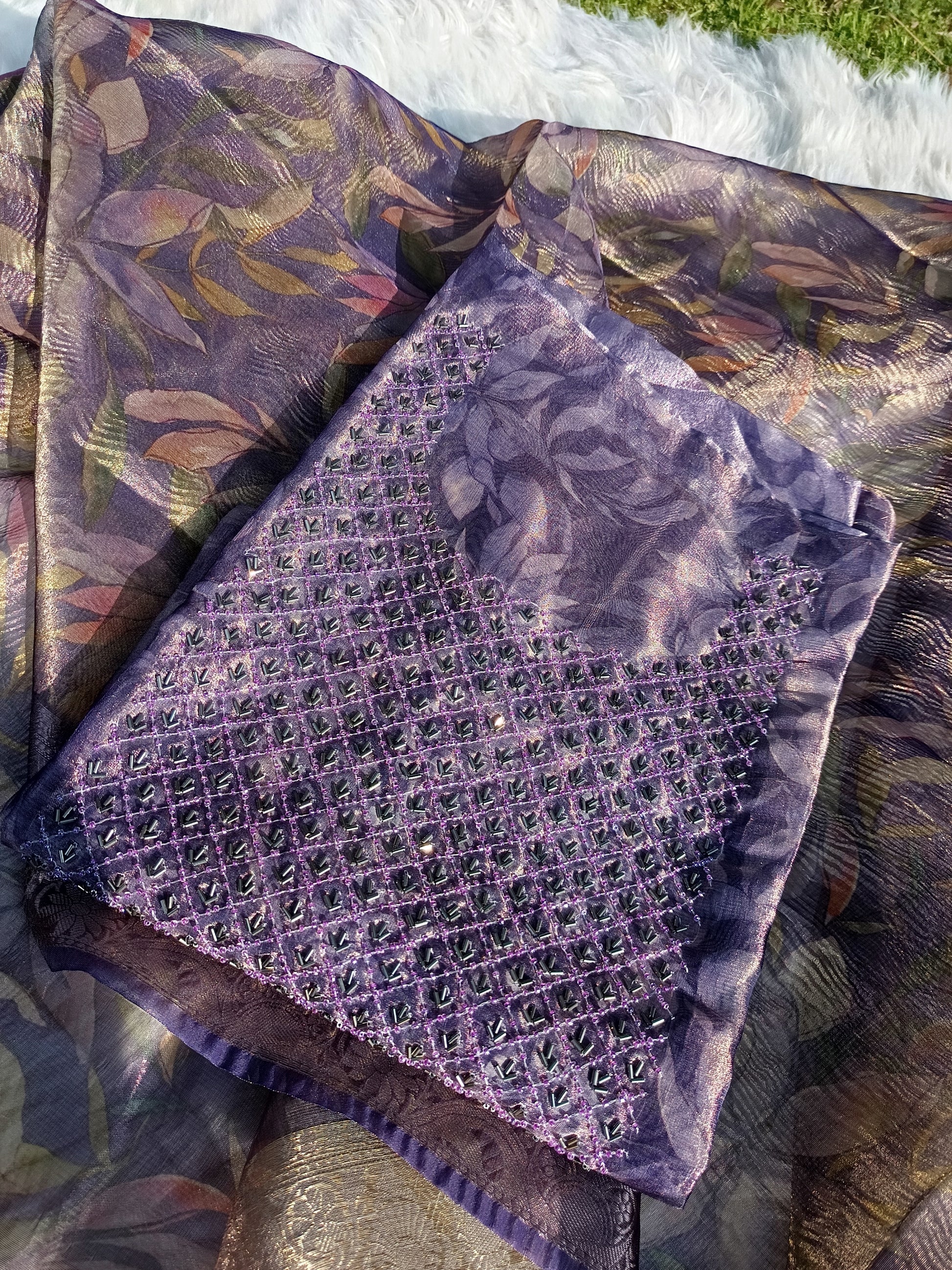 Soft tissue silk suit featuring detailed hand embroidery on sleeves