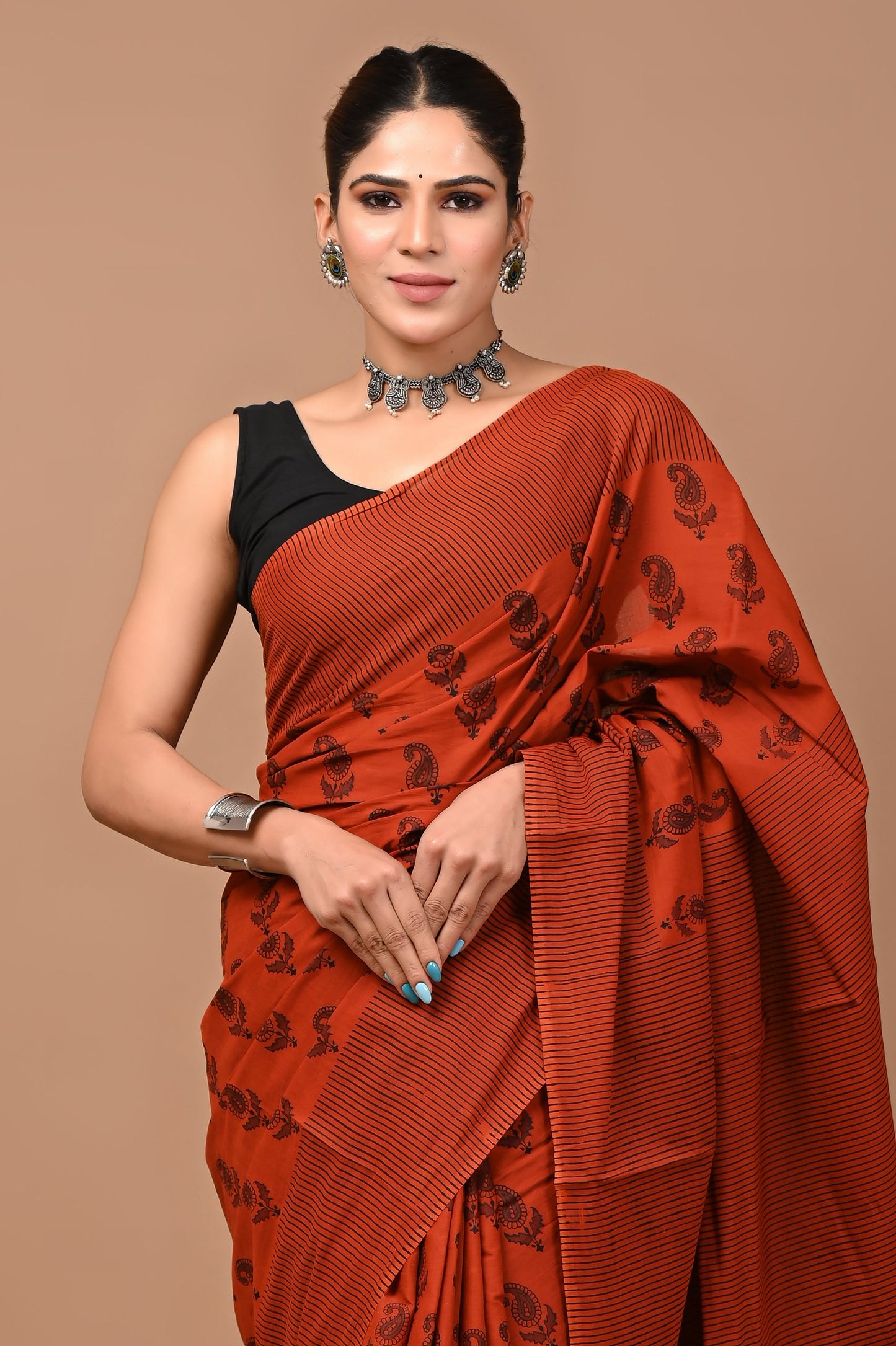 Soft and chic Printed Pure Cotton Mulmul Saree with a matching blouse for a complete look.