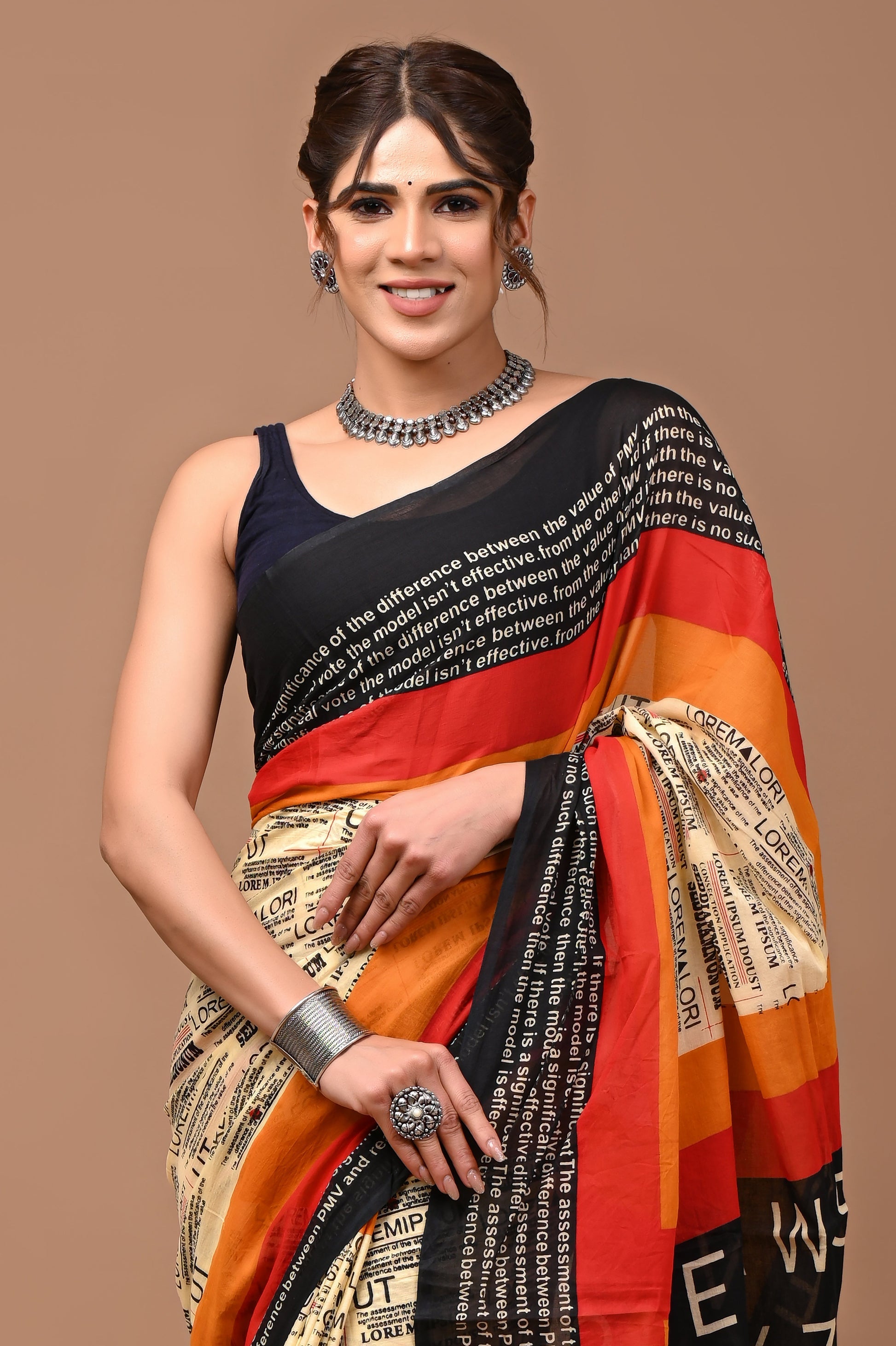 Traditional printed mulmul saree with blouse, a blend of comfort and cultural charm.